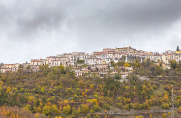 Obraz premium Small village perched on top of hill, Barrea, Abruzzo, Italy. October 13, 2017