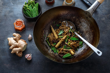 Beef and noodle stir-fry in a wok, top view