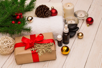 Fototapeta na wymiar spa concept, wellness objects on wood plant , christmas background. Present holiday
