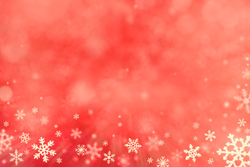 Christmas decoration with snowflakes on defocused red background.