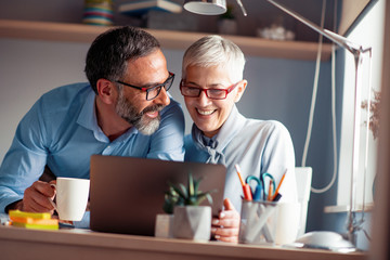 People at work in their office