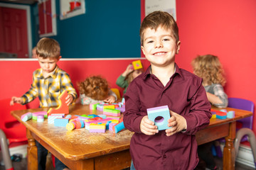 The preschoolers group in kindergarten together, Nursery group play with block ,