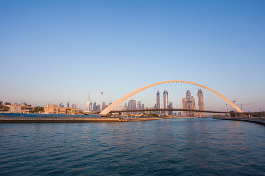 Dubai city skyline at sunset. view of Tolerance bridge