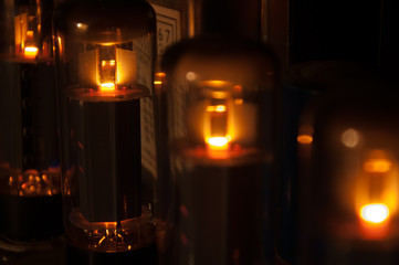 glowing electronic tube in amplifier - obrazy, fototapety, plakaty