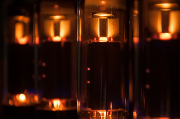 glowing electronic tube in guitar amplifier - obrazy, fototapety, plakaty