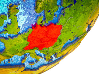 Central Europe on 3D model of Earth with water and divided countries.