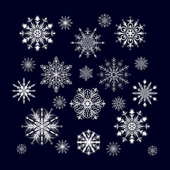 Naklejka na ściany i meble Set of detailed snowflakes isolated on blue background. Vector illustration.