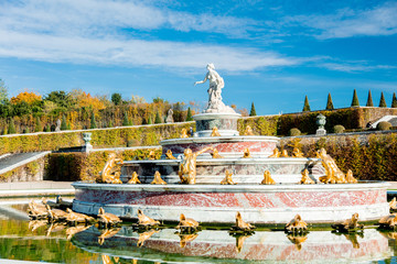 Foutain in Versailles with god and animals. Autumn season time