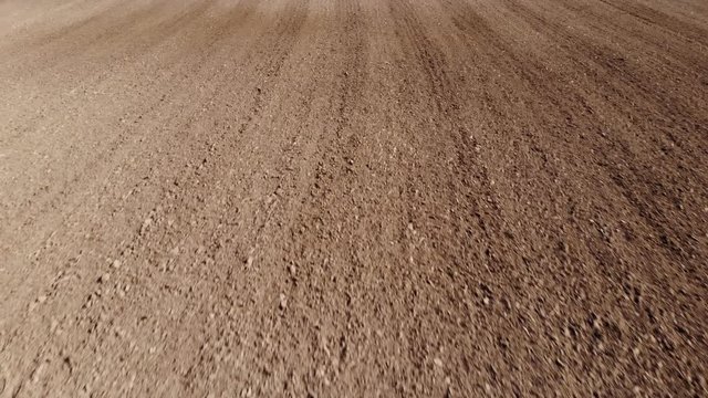 Drone footage from a plow land 