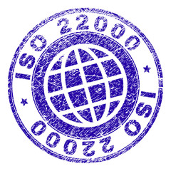 ISO 22000 stamp watermark with grunge texture. Blue vector rubber seal imprint of ISO 22000 tag with grunge texture. Seal has words arranged by circle and globe symbol.