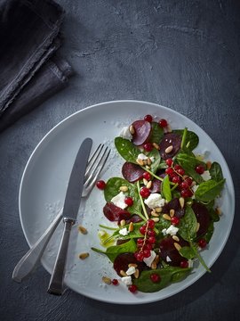Beetroot salad with baby leaf spinach, feta, redcurrants and pine nuts