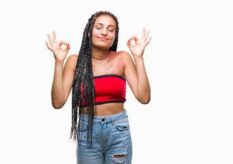 Obraz premium Young braided hair african american with pigmentation blemish birth mark over isolated background relax and smiling with eyes closed doing meditation gesture with fingers. Yoga concept.