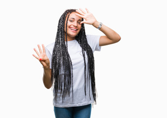 Obraz na płótnie Canvas Young braided hair african american girl over isolated background showing and pointing up with fingers number nine while smiling confident and happy.