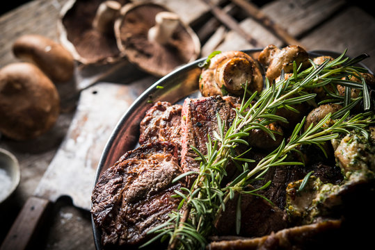 Meat with mushrooms and rosemary
