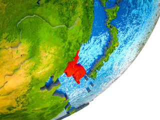 Korea on 3D model of Earth with water and divided countries.