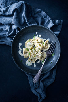 Vegan tortellini with herb sauce