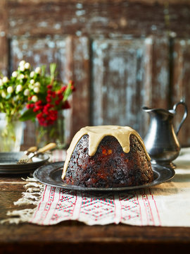 Plum pudding with brandy sauce