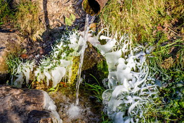 Beautiful icy spring in sunny day
