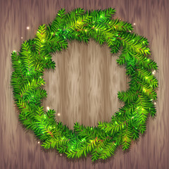 Beautiful vector Christmas wreath made of green fir tree branches with shiny sparkles on wood background. Traditional Xmas garland for holiday designs, banners, flyers, invitations, etc.