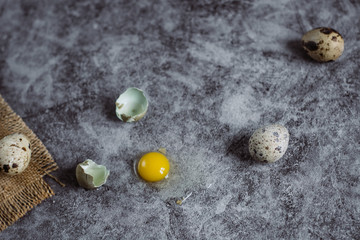 group of quail egg  on cement background, easter concept, top view  