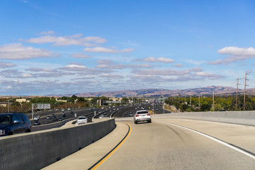 Driving on the express lane to switch between highways; Highway 880 visible in the background, south San Francisco bay, California
