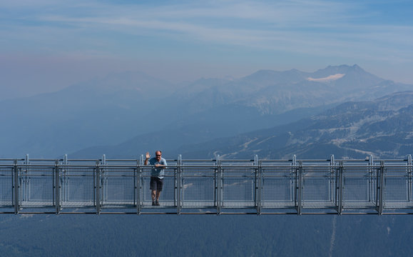Man on Suspension Bridge in Whistler British Columbia Canada