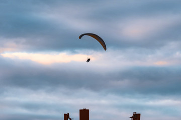 A paraglider in the evening sky of Puerto de la Cruz.