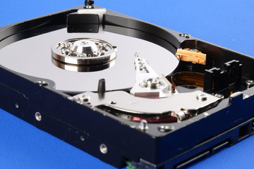 Hard disk drive (HDD) isolated on a blue background