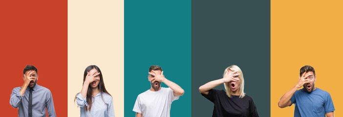 Collage of different ethnics young people over colorful stripes isolated background peeking in shock covering face and eyes with hand, looking through fingers with embarrassed expression.