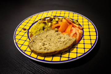 Couscous Dish on Black Wooden Background