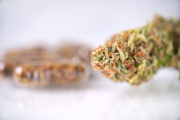 Medical marijuana concept with cannabis pills