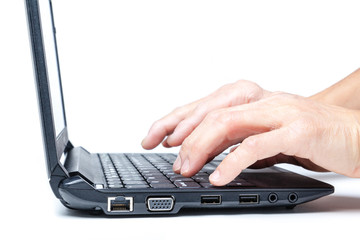 Pair of Hands Typing on Laptop Keyboard Isolated on White Background