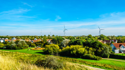 Wind Farm behind the resort community of De Banjaard behind the dunes along the Oosterschelde inlet in the Netherlands