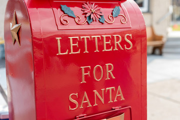 Bright shiny red mailbox for letters for Santa