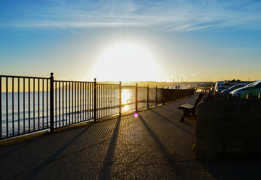Sun Setting Behind Railings at the Bay