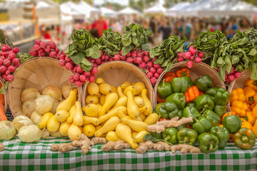 A verity of fresh vegetables beautifully displayed at the local farmers market, you will find a verity of organically grown vegetables.
