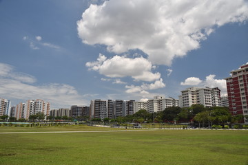 A sunny day with white cloud and blue sky outside Pasir Ris MRT station in Singapore
