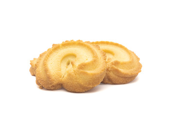 one side of two butter cookies on white background