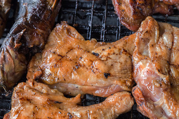 grilled chicken breasts cooked on a BBQ