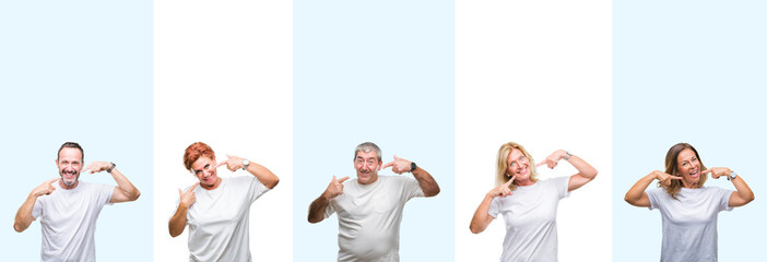 Collage of group middle age and senior people wearing white t-shirt over isolated background smiling confident showing and pointing with fingers teeth and mouth. Health concept.