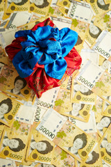 Traditional Korean wrapping cloth with Korean won banknotes background 