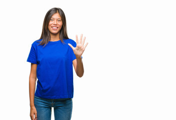 Young asian woman over isolated background showing and pointing up with fingers number five while smiling confident and happy.