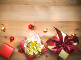 christmas decoration with wood  background.gift box top view on wood table.snow graphic pattern.