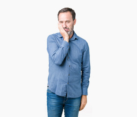 Fototapeta premium Handsome middle age elegant senior man over isolated background thinking looking tired and bored with depression problems with crossed arms.