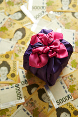 Traditional Korean wrapping cloth with Korean won banknotes background 