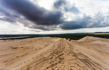 white sand dunes in the cloud day, Mui Ne Vietnam