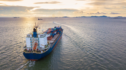 Cargo ship in the sea with the sunset © Photo Gallery