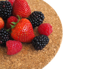 Fresh strawberry, raspberry and blackberry on wooden background, healthy food and diet.