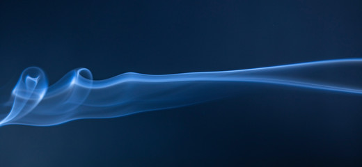 Abstract blue smoke swirls