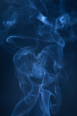 Abstract blue smoke swirls